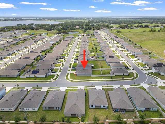 489 Panaro Ln, Haines City, FL 33844 - aerial perspective of suburban area with a large body of water