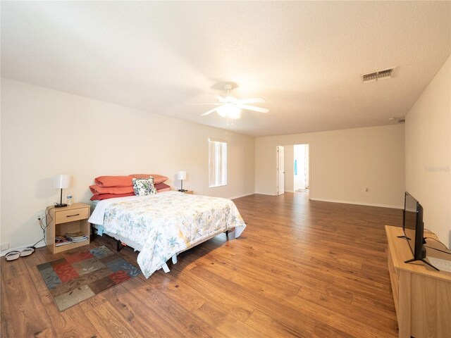 8330 Lainie Ln, Orlando, FL 32818 - bedroom featuring wood finished floors and ceiling fan