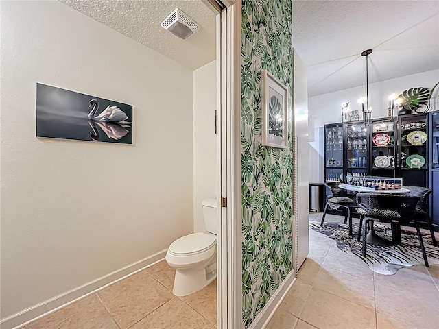 6336 Buford St Unit 207, Orlando, FL 32835 - bathroom with tile patterned floors and a textured ceiling