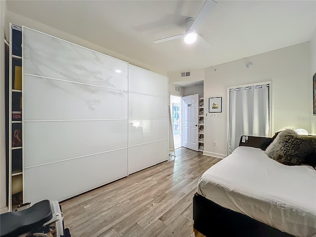 6336 Buford St Unit 207, Orlando, FL 32835 - bedroom with wood finished floors and a ceiling fan