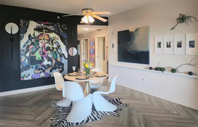 6336 Buford St Unit 207, Orlando, FL 32835 - dining space featuring baseboards and a ceiling fan