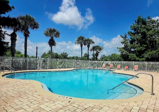 6336 Buford St Unit 207, Orlando, FL 32835 - community pool with a patio area