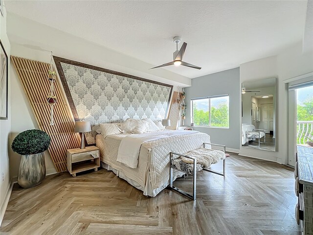 6336 Buford St Unit 207, Orlando, FL 32835 - bedroom featuring an accent wall, access to outside, and a ceiling fan
