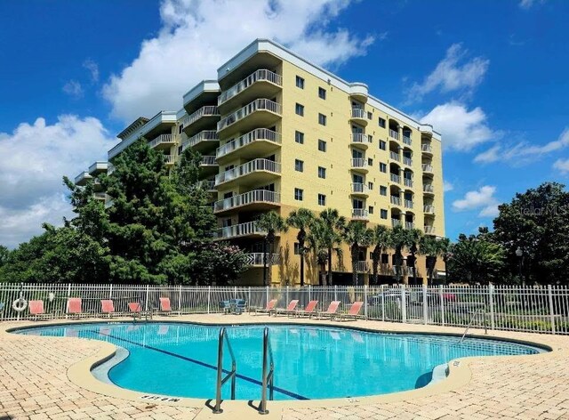 6336 Buford St Unit 207, Orlando, FL 32835 - community pool with a patio area