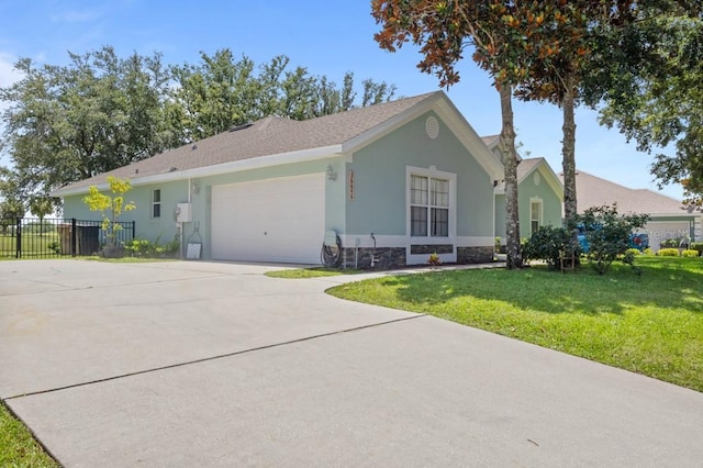 36646 Oconee Ave, Eustis, FL 32736 - ranch-style home featuring a garage, stucco siding, concrete driveway, and stone siding