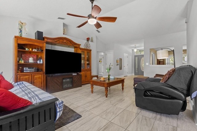 36646 Oconee Ave, Eustis, FL 32736 - living area featuring ceiling fan and vaulted ceiling