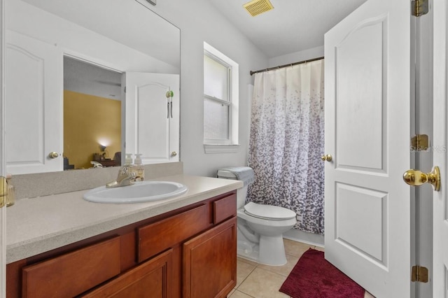 36646 Oconee Ave, Eustis, FL 32736 - bathroom featuring vanity, tile patterned flooring, toilet, and a shower with shower curtain