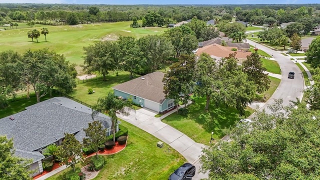 36646 Oconee Ave, Eustis, FL 32736 - aerial perspective of suburban area with a golf course and a tree filled landscape