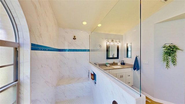 14723 Pine Cone Trl, Clermont, FL 34711 - full bath featuring a marble finish shower, vanity, and recessed lighting
