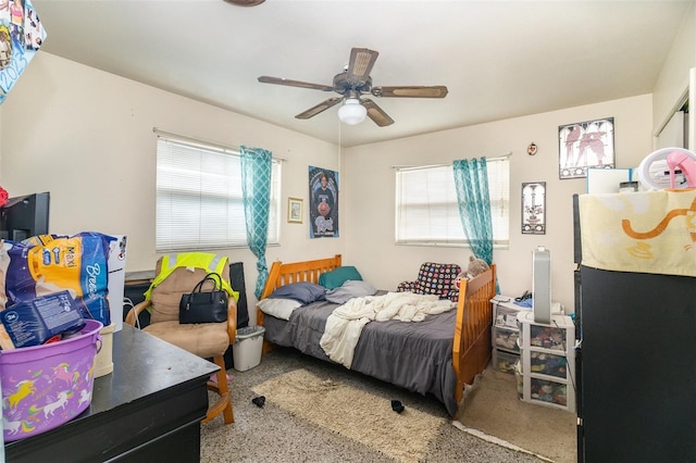 987 Alsup Dr, Rockledge, FL 32955 - bedroom with multiple windows and ceiling fan