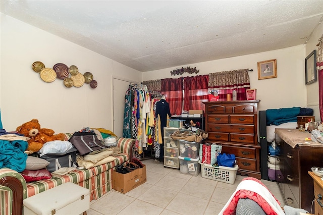 987 Alsup Dr, Rockledge, FL 32955 - tiled bedroom with a textured ceiling