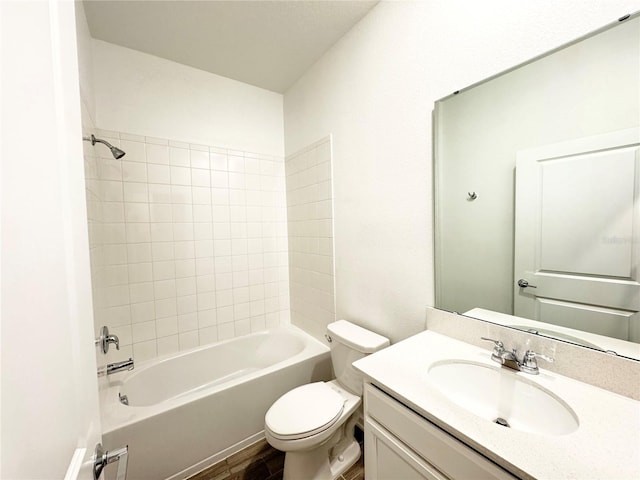 1147 Pomelo St, Davenport, FL 33837 - full bath featuring toilet, vanity, shower / bathtub combination, and wood finished floors