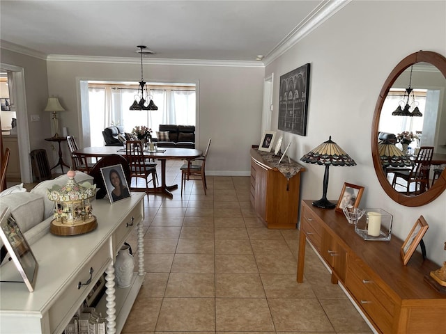 1120 SE 6th Ter, Pompano Beach, FL 33060 - living room featuring a chandelier, ornamental molding, and light tile patterned flooring