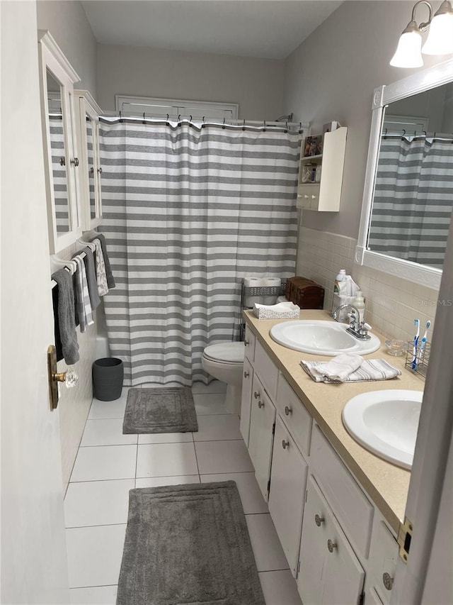 1120 SE 6th Ter, Pompano Beach, FL 33060 - full bathroom with double vanity, tile patterned flooring, and a shower with shower curtain
