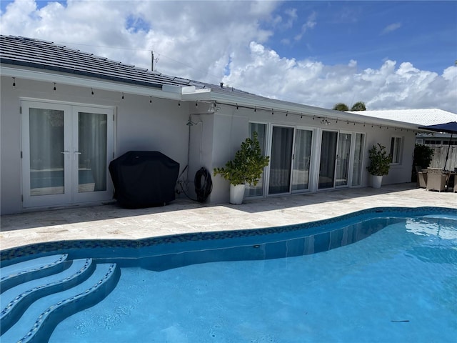 1120 SE 6th Ter, Pompano Beach, FL 33060 - outdoor pool with french doors and a patio area