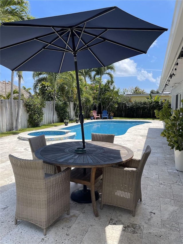 1120 SE 6th Ter, Pompano Beach, FL 33060 - view of swimming pool with outdoor dining space, a fenced backyard, and a patio area
