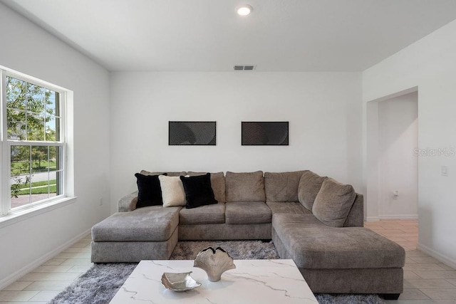 1551 Gateway Ln, Kissimmee, FL 34746 - living area featuring baseboards