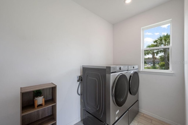 1551 Gateway Ln, Kissimmee, FL 34746 - washroom featuring washer and dryer, recessed lighting, and light wood-type flooring
