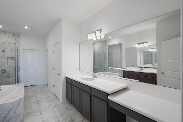 1551 Gateway Ln, Kissimmee, FL 34746 - full bathroom with marble finish flooring, a marble finish shower, a bath, two vanities, and recessed lighting