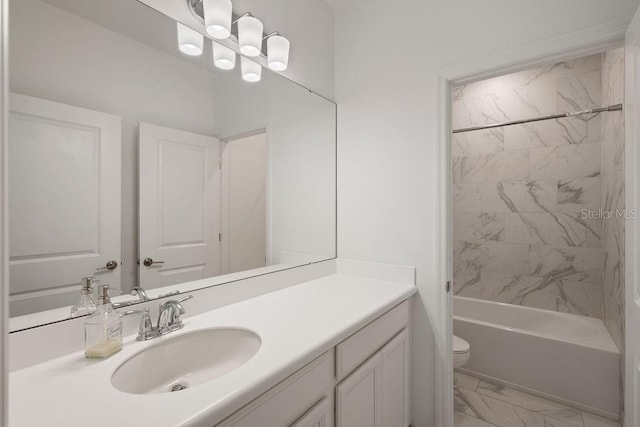 1551 Gateway Ln, Kissimmee, FL 34746 - bathroom with vanity, marble look tiles, and washtub / shower combination