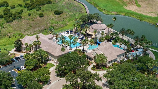 1551 Gateway Ln, Kissimmee, FL 34746 - aerial overview of property's location with a pool and a nearby body of water