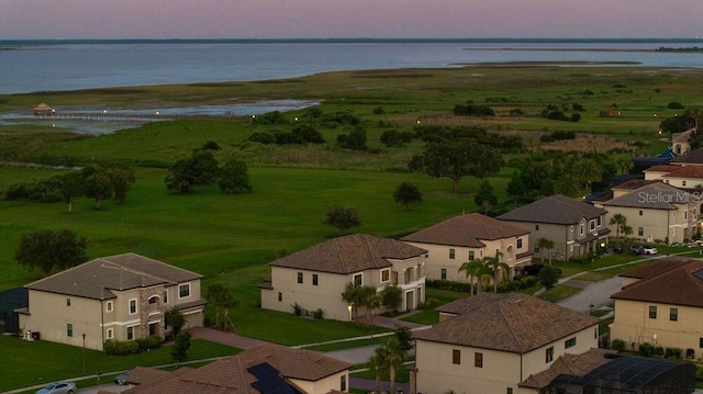 1551 Gateway Ln, Kissimmee, FL 34746 - aerial view at dusk of a water view and a residential view