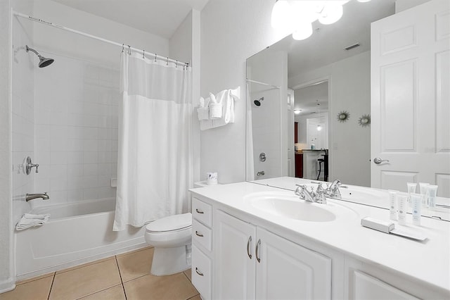5024 Shoreway Loop Unit 10106, Orlando, FL 32819 - bathroom with vanity, tile patterned floors, and shower / tub combo with curtain