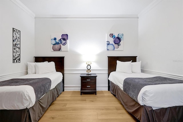 5024 Shoreway Loop Unit 10106, Orlando, FL 32819 - bedroom featuring crown molding and light wood-style floors