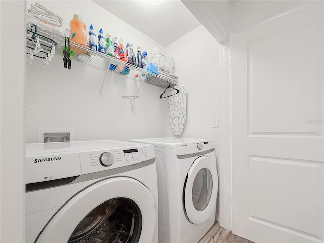 1471 Mirabella Cir, Davenport, FL 33897 - washroom featuring washer and dryer and light wood finished floors