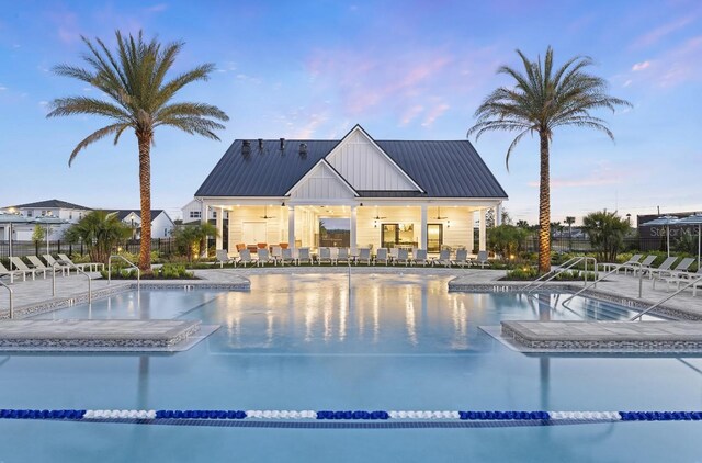 1667 Eaglehurst Ln, Apopka, FL 32703 - community pool featuring a patio and ceiling fan