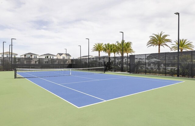 1667 Eaglehurst Ln, Apopka, FL 32703 - view of tennis court featuring community basketball court and a residential view