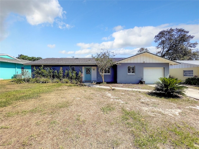 249 Spartan Dr, Maitland, FL 32751 - single story home with an attached garage and board and batten siding