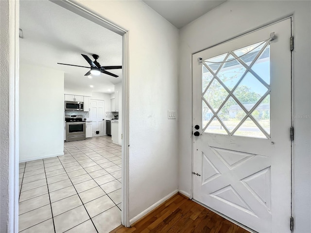 249 Spartan Dr, Maitland, FL 32751 - entryway featuring a ceiling fan and light wood-style floors