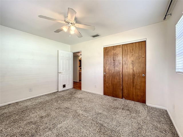 249 Spartan Dr, Maitland, FL 32751 - unfurnished bedroom featuring carpet floors, a closet, and ceiling fan
