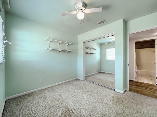 249 Spartan Dr, Maitland, FL 32751 - unfurnished bedroom with carpet floors, a closet, and ceiling fan