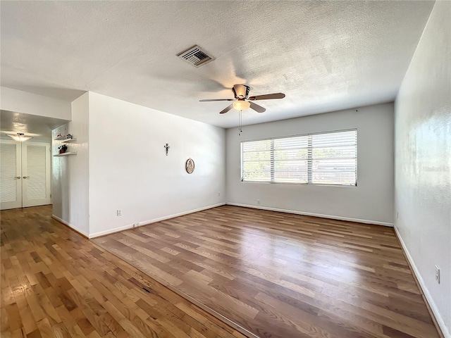 249 Spartan Dr, Maitland, FL 32751 - spare room with ceiling fan, wood finished floors, and a textured ceiling