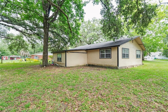 1753 NW 44th St, Ocala, FL 34475 - back of property with a yard
