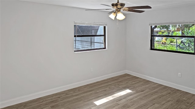 2804 Clearfield Ave, Orlando, FL 32808 - unfurnished room with wood finished floors and a ceiling fan