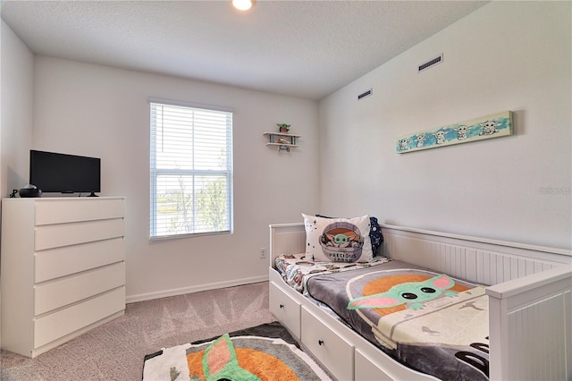 832 Longboat Dr, Davenport, FL 33896 - bedroom featuring carpet floors and a textured ceiling