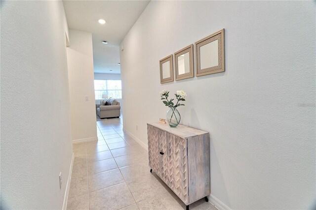 832 Longboat Dr, Davenport, FL 33896 - hallway featuring light tile patterned flooring and recessed lighting