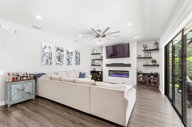 25537 High Hampton Cir, Sorrento, FL 32776 - living room with a large fireplace, wood finished floors, recessed lighting, a ceiling fan, and baseboards