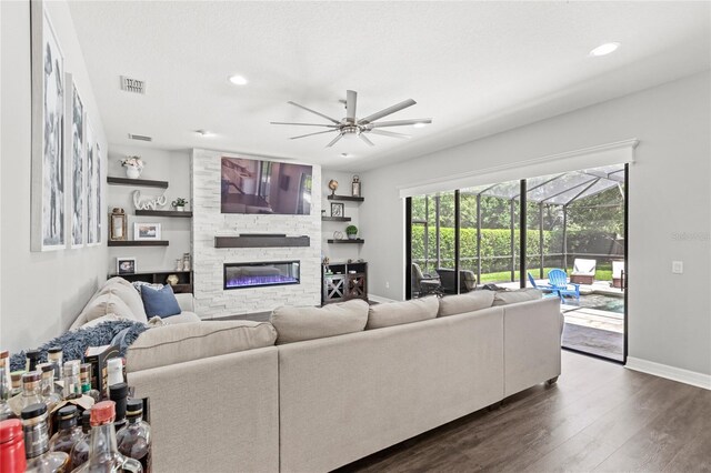 25537 High Hampton Cir, Sorrento, FL 32776 - living room with baseboards, ceiling fan, a fireplace, dark wood-style flooring, and recessed lighting