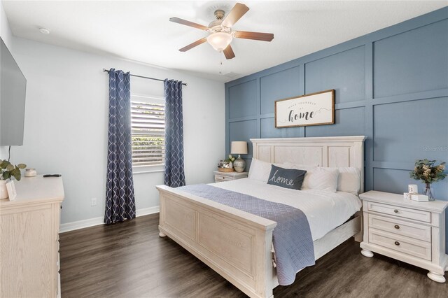 25537 High Hampton Cir, Sorrento, FL 32776 - bedroom featuring dark wood-type flooring, baseboards, and a ceiling fan