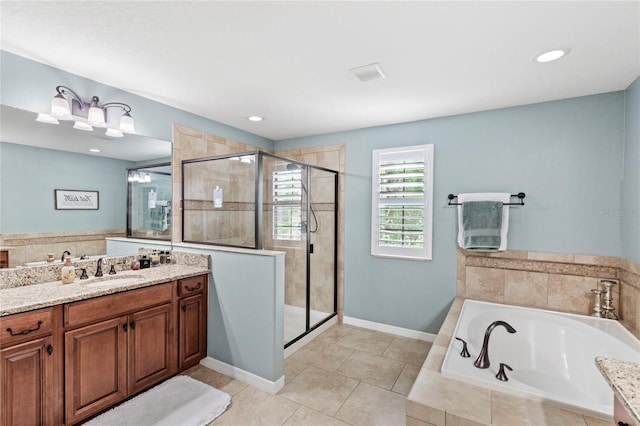 25537 High Hampton Cir, Sorrento, FL 32776 - bathroom featuring vanity, a garden tub, a shower stall, and tile patterned floors