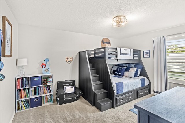 25537 High Hampton Cir, Sorrento, FL 32776 - carpeted bedroom with a textured ceiling