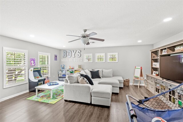 25537 High Hampton Cir, Sorrento, FL 32776 - living area featuring ceiling fan, wood finished floors, recessed lighting, plenty of natural light, and baseboards