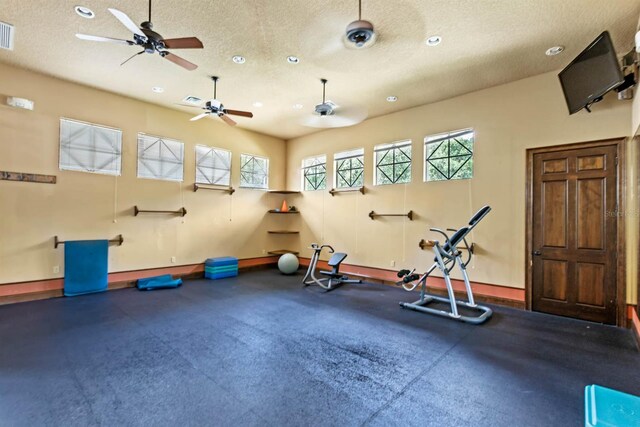 25537 High Hampton Cir, Sorrento, FL 32776 - workout room with a textured ceiling, baseboards, ceiling fan, and recessed lighting