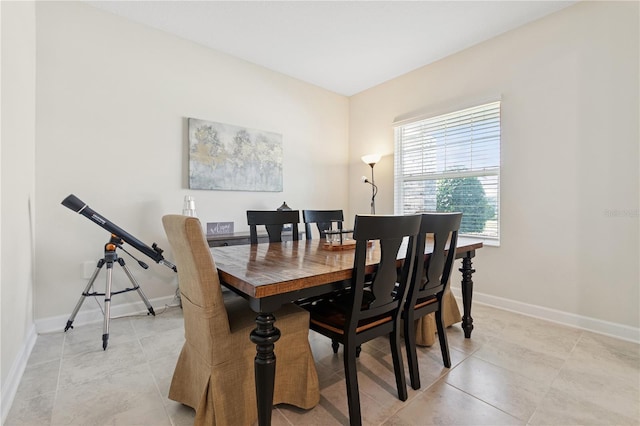 2279 Mountain Pine St, Ocoee, FL 34761 - dining area featuring baseboards and light tile patterned floors