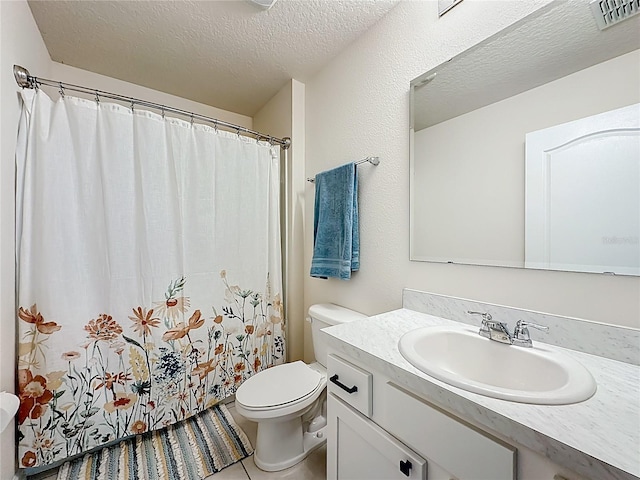 1 Zinnia Ct, Palm Coast, FL 32164 - full bath featuring vanity, a textured ceiling, tile patterned floors, and a shower with shower curtain