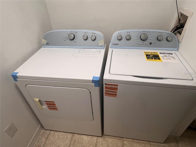 5459 Vineland Rd Unit 4310, Orlando, FL 32811 - washroom featuring independent washer and dryer